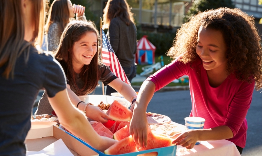 Kids smiling at community event