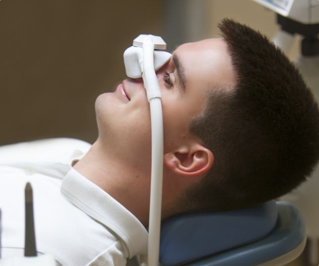 Dental patient receiving nitrous oxide sedation dentistry