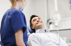 Patient sitting in the dentist’s chair