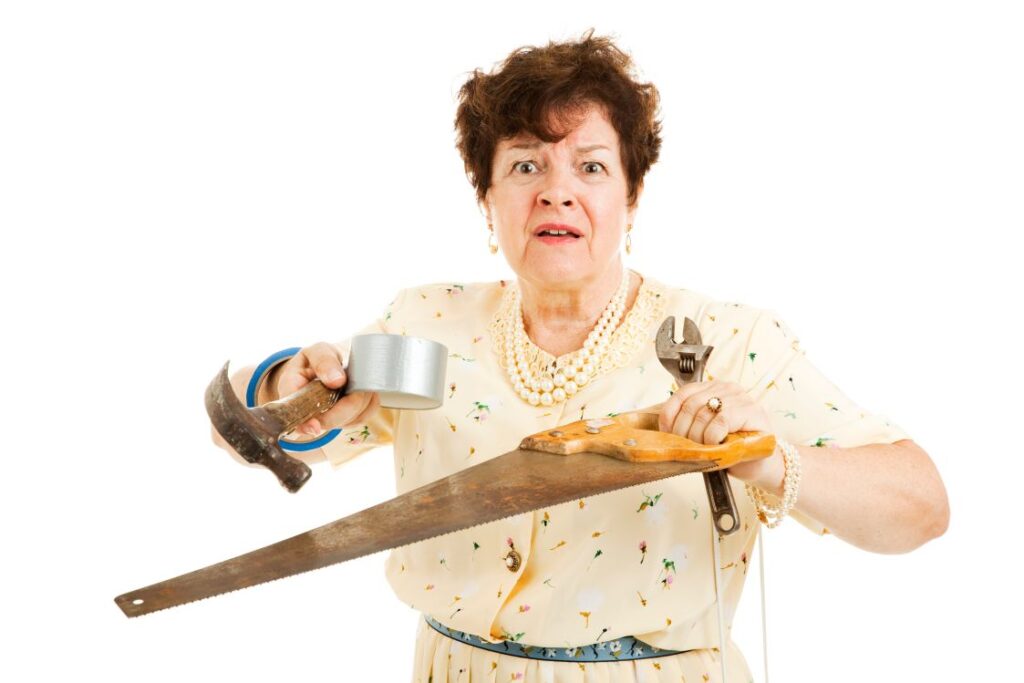 A woman overwhelmed by a DIY project